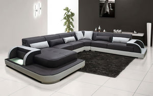 Molinaro Leather Sectional with Adjustable Headrest